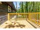 Newly built deck wraps around the house, providing access to an expansive yard at 809 Vinton Wood Rd, Forest Park, GA 30297