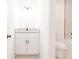 Bathroom featuring a granite countertop sink and toilet at 809 Vinton Wood Rd, Forest Park, GA 30297