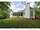 Charming backyard with a spacious screened-in porch and large, grassy area at 823 Laurel Crest Sw Ct, Marietta, GA 30064