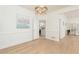 Dining room featuring a modern chandelier, hardwood floors, and white walls at 823 Laurel Crest Sw Ct, Marietta, GA 30064