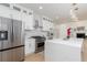 Modern kitchen featuring white cabinetry, stainless steel appliances, and a large center island at 823 Laurel Crest Sw Ct, Marietta, GA 30064