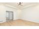 Spacious living room with tray ceilings, wood floors, and bright natural light at 823 Laurel Crest Sw Ct, Marietta, GA 30064