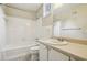 Bathroom featuring white tiled shower/tub, neutral walls, and white single vanity at 95 Brandon Ridge Dr, Atlanta, GA 30328