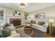 Inviting living room with a cozy fireplace, stylish seating, and elegant decor for comfortable gatherings at 95 Brandon Ridge Dr, Atlanta, GA 30328