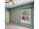 This bedroom features a window and neutral carpeting at 1749 Grand Oaks Dr, Woodstock, GA 30188