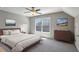 This is a virtually staged bedroom that features a window at 1749 Grand Oaks Dr, Woodstock, GA 30188