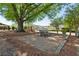Outdoor area with picnic table under a large tree offering shade and a place to relax at 1749 Grand Oaks Dr, Woodstock, GA 30188