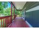 Inviting covered front porch, a perfect spot to relax and enjoy the surroundings at 233 Clayton St, Fairburn, GA 30213