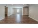 Inviting living room featuring recessed lights, neutral walls, and wood-look flooring at 233 Clayton St, Fairburn, GA 30213
