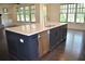 Stylish kitchen island has stainless steel dishwasher and gleaming countertops at 333 Mont Harmony Sw Rd, Powder Springs, GA 30127