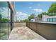 Cozy balcony with wood flooring offering a tranquil outdoor space accessible through sliding glass doors at 71 Krog Ne St, Atlanta, GA 30307