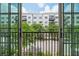A view from a balcony showcasing a residential street with trees and nearby apartment buildings at 71 Krog Ne St, Atlanta, GA 30307