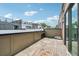 Balcony with wood flooring and sliding glass doors for indoor/outdoor living and great natural light at 71 Krog Ne St, Atlanta, GA 30307