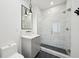 Bathroom featuring a glass shower, a modern vanity with a marble countertop, and sleek fixtures at 71 Krog Ne St, Atlanta, GA 30307
