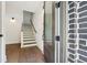 Welcoming entryway with staircase and hardwood flooring at 71 Krog Ne St, Atlanta, GA 30307