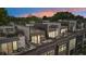 Elegant townhomes with private rooftop terraces, offering stunning views and a luxurious urban lifestyle at 71 Krog Ne St, Atlanta, GA 30307