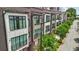 Modern townhome showcasing a brick facade, complemented by large windows and well-maintained landscaping at 71 Krog Ne St, Atlanta, GA 30307