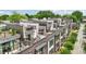 Luxury townhomes featuring modern design with private rooftop terraces and outdoor seating areas at 71 Krog Ne St, Atlanta, GA 30307