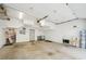 Bright and spacious two-car garage featuring ample lighting and functional storage solutions at 71 Krog Ne St, Atlanta, GA 30307