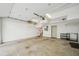 Clean two-car garage featuring bright lighting and storage options for a functional and organized space at 71 Krog Ne St, Atlanta, GA 30307