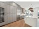 Modern kitchen featuring stainless steel appliances, island, and gray cabinetry at 71 Krog Ne St, Atlanta, GA 30307