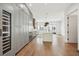 Modern kitchen with stainless steel appliances, a large island, and hardwood flooring, bathed in natural light at 71 Krog Ne St, Atlanta, GA 30307