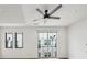Bright living room featuring a ceiling fan and a sliding glass door leading to the outside at 71 Krog Ne St, Atlanta, GA 30307