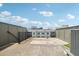 Expansive roof deck with black metal railing and city views provide a relaxing urban retreat at 71 Krog Ne St, Atlanta, GA 30307