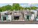 An exterior rooftop view features multiple outdoor spaces for relaxing and entertaining at 71 Krog Ne St, Atlanta, GA 30307