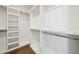 Spacious walk-in closet with custom shelving and rod system, perfect for organization at 71 Krog Ne St, Atlanta, GA 30307