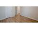 This bedroom has wood floors and two doors at 123 Matson Sw Run, Mableton, GA 30126