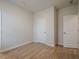This bedroom has wood floors and two doors at 123 Matson Sw Run, Mableton, GA 30126