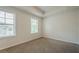 Bedroom featuring natural light, neutral carpet and window overlooking neighborhood at 123 Matson Sw Run, Mableton, GA 30126