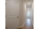 Bright hallway with hardwood floors leads to an inviting entryway at 123 Matson Sw Run, Mableton, GA 30126