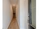 This hallway features hardwood floors and leads to the stairs at 123 Matson Sw Run, Mableton, GA 30126