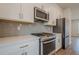 Well-equipped kitchen featuring stainless steel appliances and quartz countertops at 123 Matson Sw Run, Mableton, GA 30126