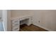 Dedicated office space with white desk and drawers and wood look floors at 123 Matson Sw Run, Mableton, GA 30126