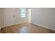This room has wood floors, a window for natural light, and two doors at 123 Matson Sw Run, Mableton, GA 30126