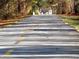 Scenic walking path surrounded by trees, perfect for outdoor recreation and exercise at 123 Matson Sw Run, Mableton, GA 30126