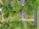 Aerial view of a home showcasing the backyard, deck, and surrounding greenery at 2166 Carlyle Dr, Marietta, GA 30062