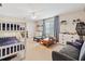 Bedroom with bunk beds, a sofa, and a toy table, ideal for  at 2166 Carlyle Dr, Marietta, GA 30062