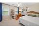 Cozy bedroom with neutral tones, a ceiling fan, and stylish decor and furnishings at 2166 Carlyle Dr, Marietta, GA 30062