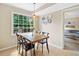 Bright dining room features natural lighting from a large window and decorative wall plates at 2166 Carlyle Dr, Marietta, GA 30062