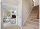 Inviting entryway featuring staircase and view into the cozy living room at 2166 Carlyle Dr, Marietta, GA 30062