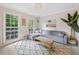 Comfortable living room features natural light, contemporary furnishings, and stylish decor at 2166 Carlyle Dr, Marietta, GA 30062