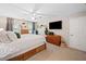 Bedroom showcasing neutral tones, bright natural light, and warm, wood furnishings at 2166 Carlyle Dr, Marietta, GA 30062