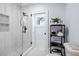 Modern bathroom with a glass shower, and a shelf with decor at 2381 Jones Phillips Rd, Dacula, GA 30019