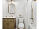 Bathroom featuring classic gold fixtures, a vanity, and a shower with a curtain at 2381 Jones Phillips Rd, Dacula, GA 30019