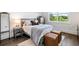 Bedroom featuring a bed with a soft rug and leather stools at 2381 Jones Phillips Rd, Dacula, GA 30019