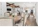 Open floor plan seamlessly integrates dining area into the living and kitchen spaces at 2381 Jones Phillips Rd, Dacula, GA 30019